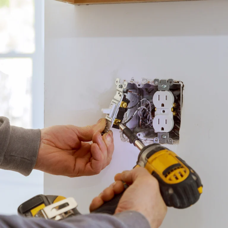 Common Residential Electrical Services Explained: Licensed electrician upgrading a home’s electrical panel for safety and efficiency