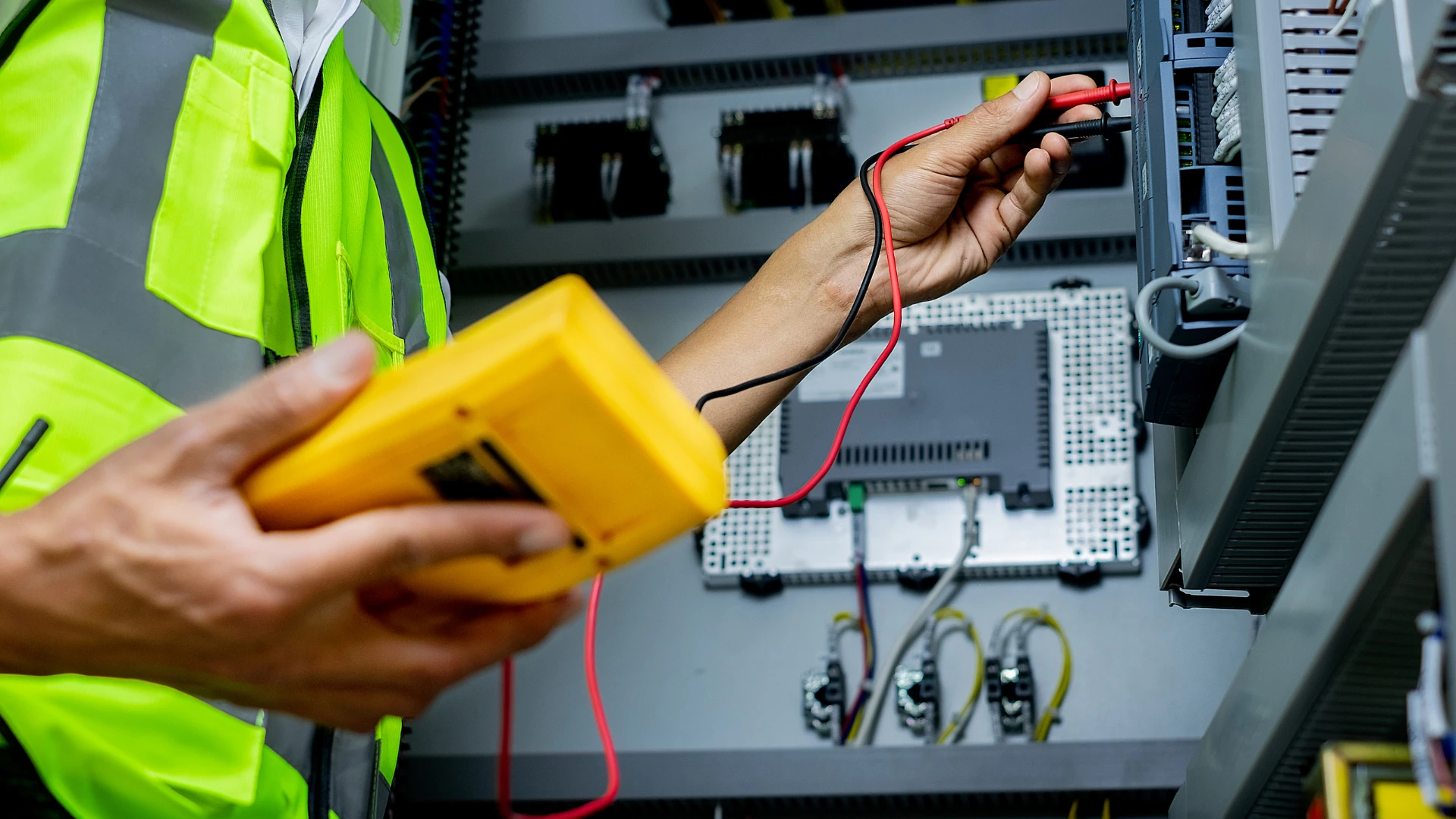 Licensed technician performing residential electrical repair services on a main panel in an Ontario home