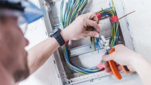 Commercial Wiring hidden behind office fixtures ensuring safety and compliance